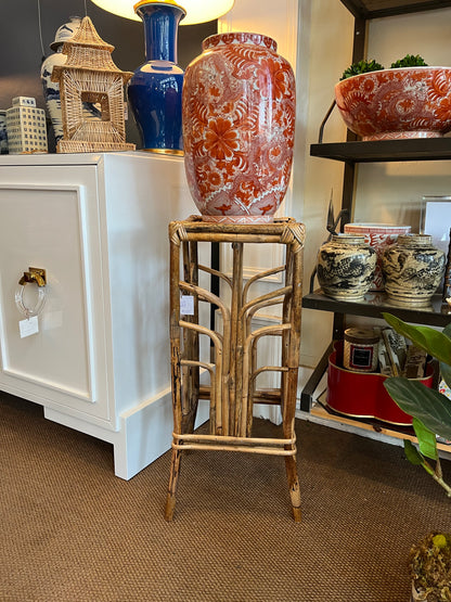 Bamboo plant stand on display